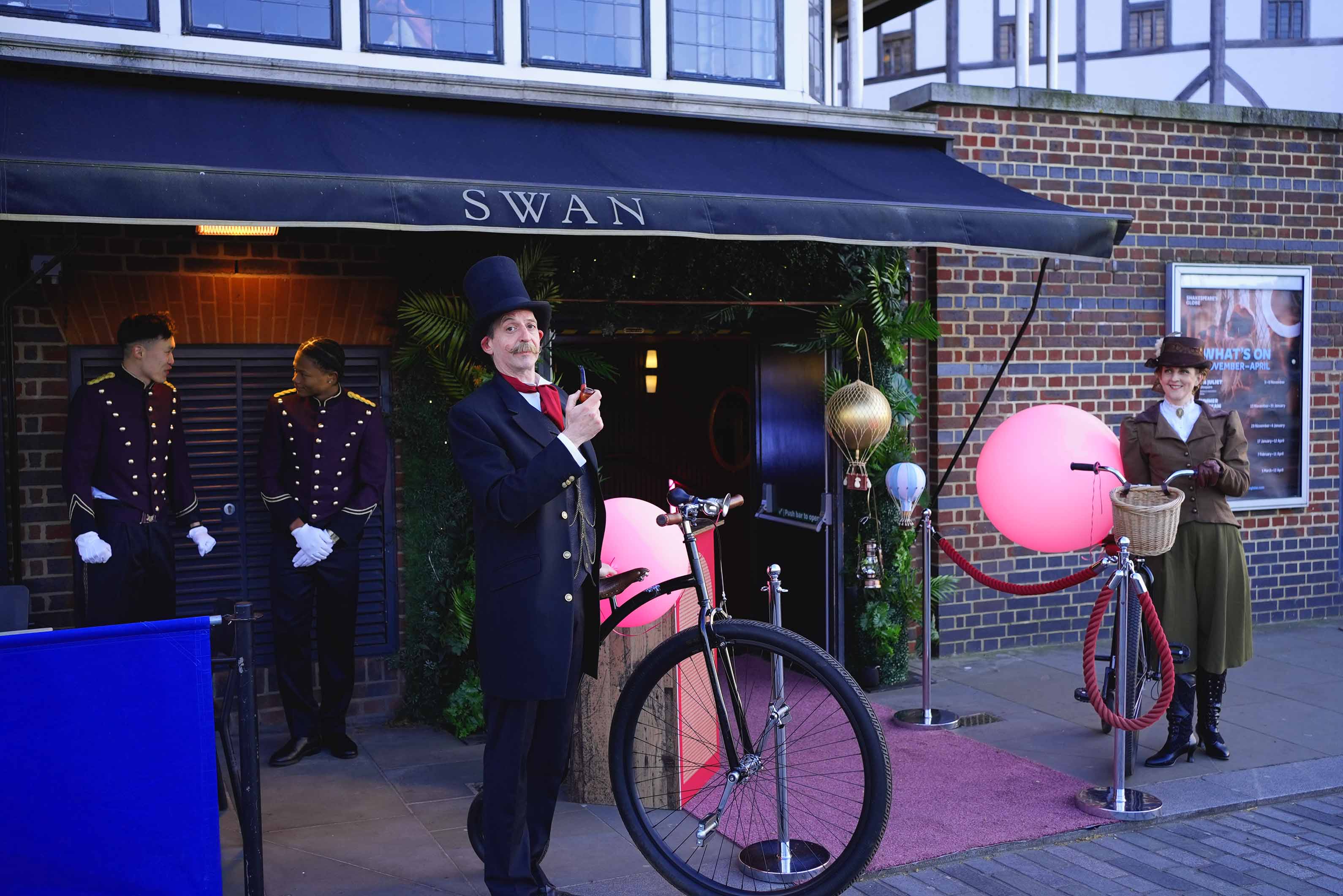 Swans by the Thames River